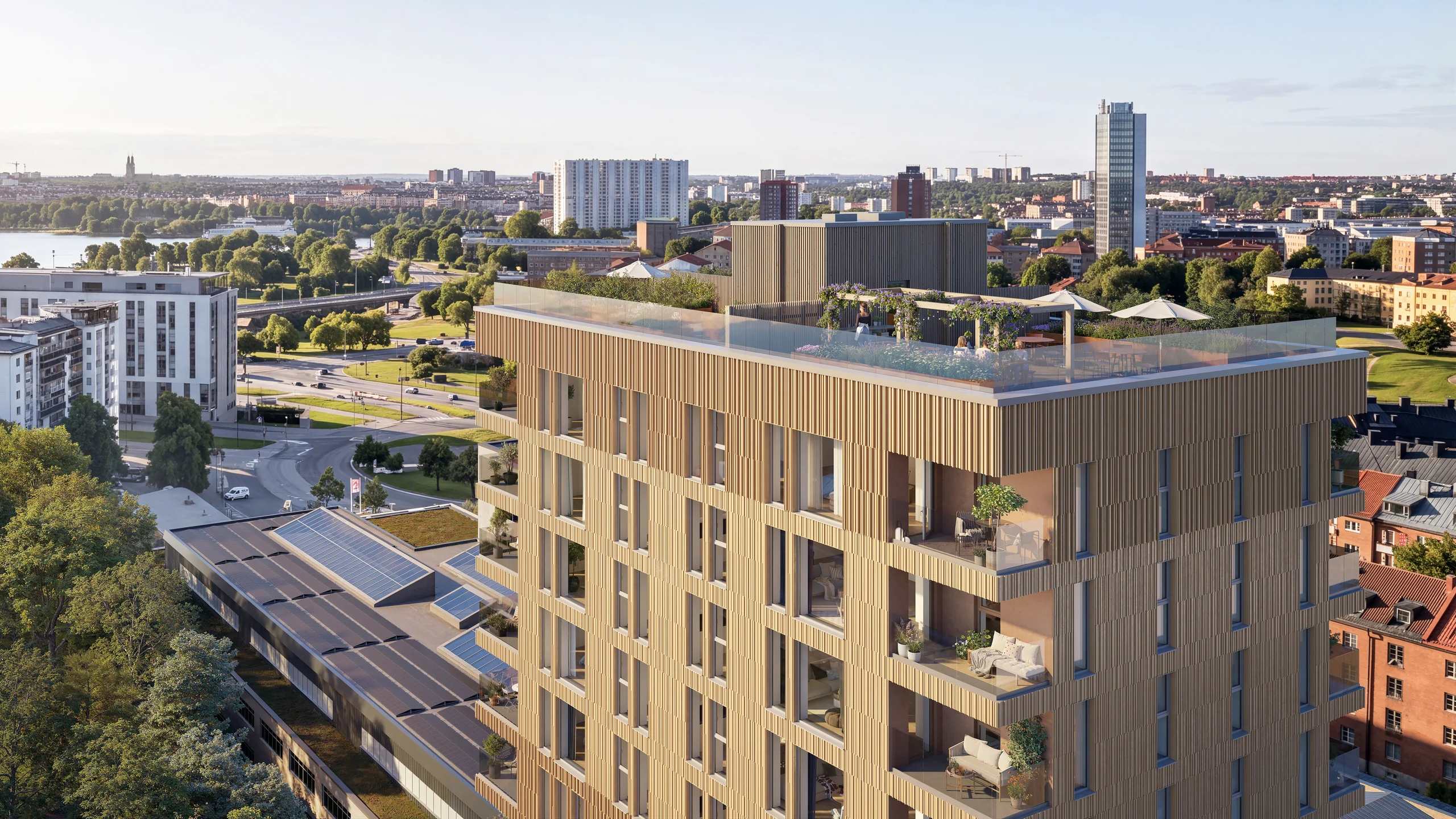 Vy ovanifrån över Ekedalsterrassens takterrasser och övre våningar med Stockholm i bakgrunden